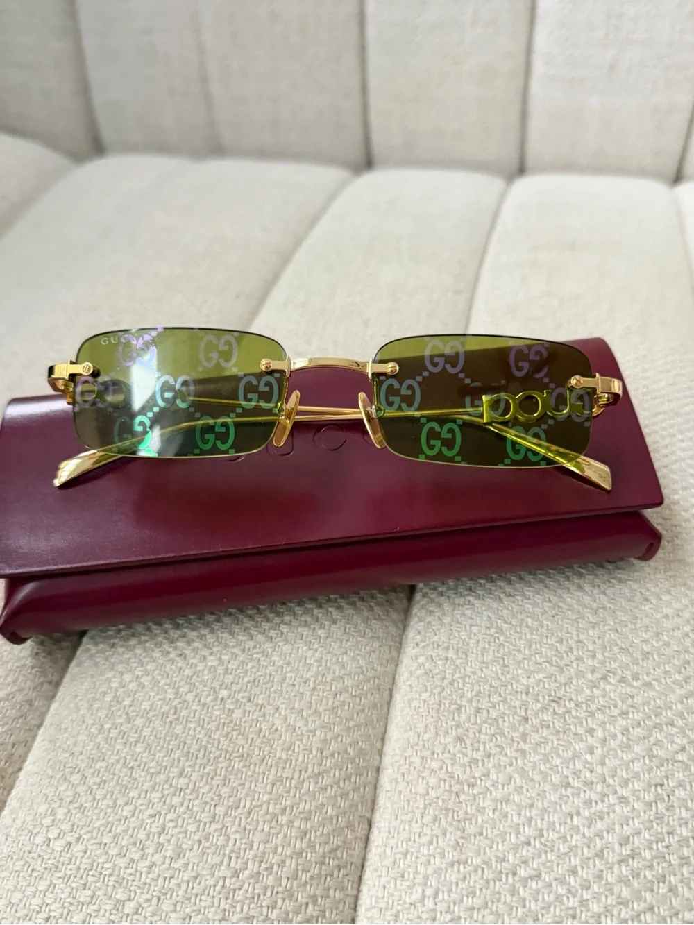 Gucci women’s Rimless Logo Sunglasses in Green